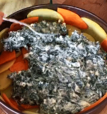 filling potatoes with spinach torta