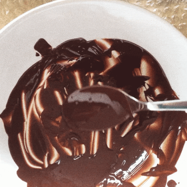 melted dark chocolate left overs in a bowl