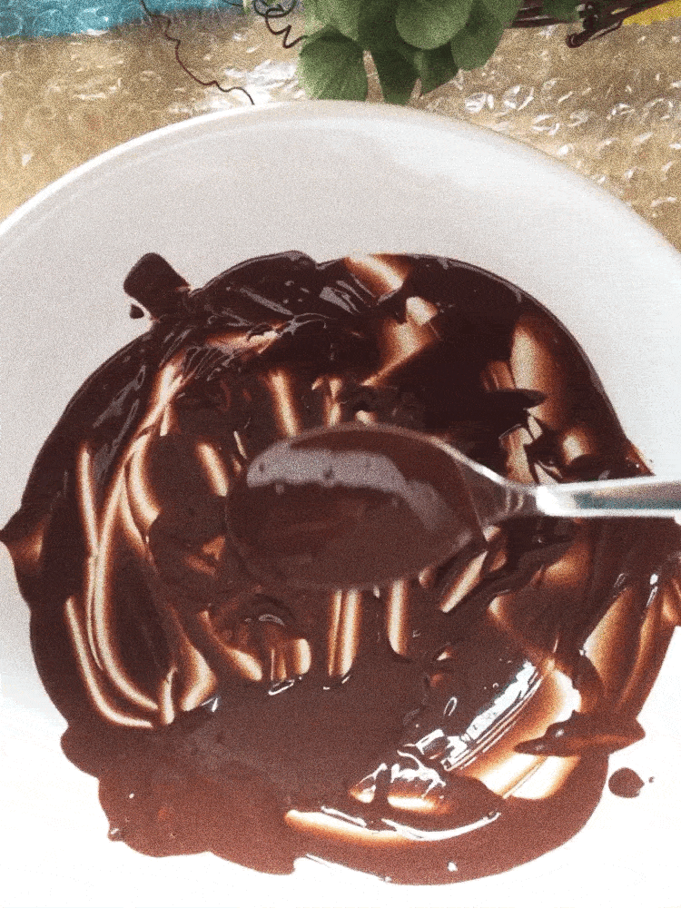 melted dark chocolate left overs in a bowl