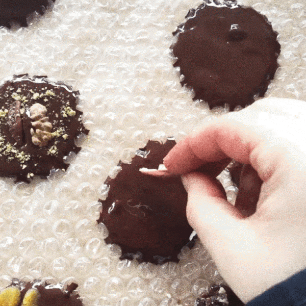 freshly melted dark chocolate on bubble wrap