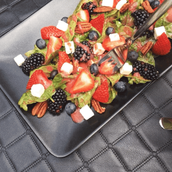 Tasting salad with fork