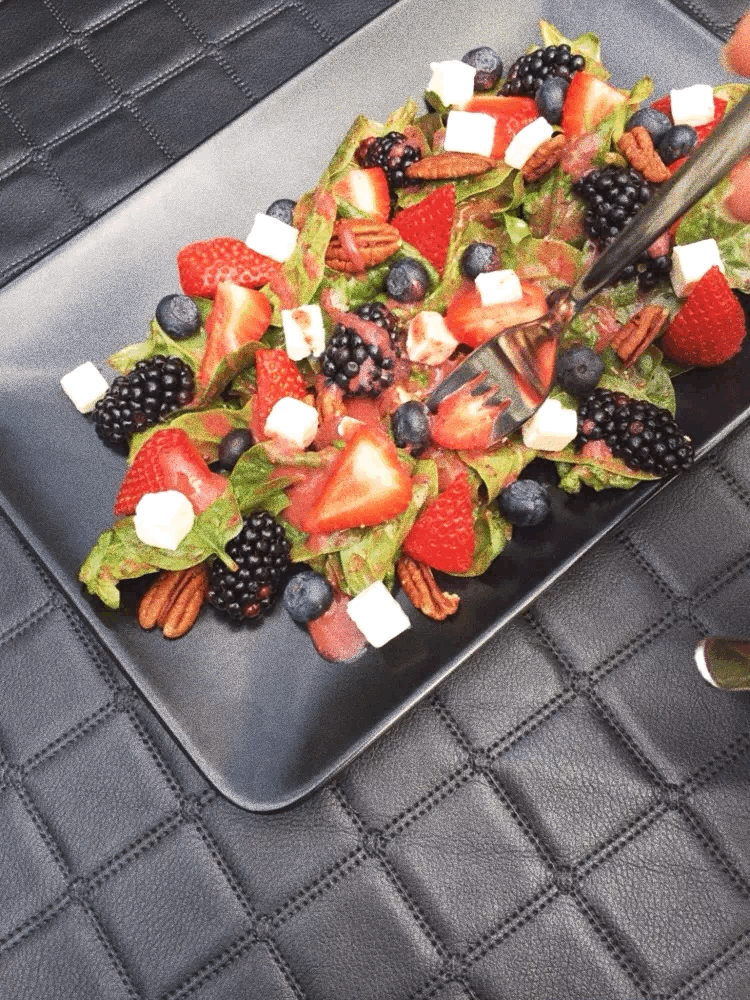 Tasting salad with fork