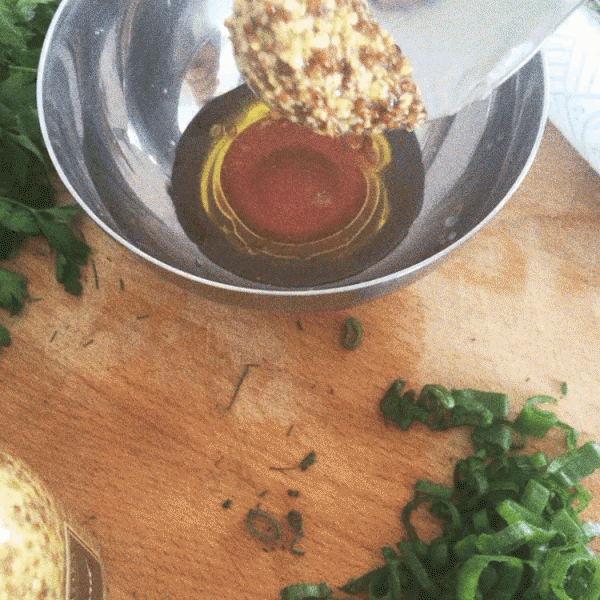 Dipping mustard in oil