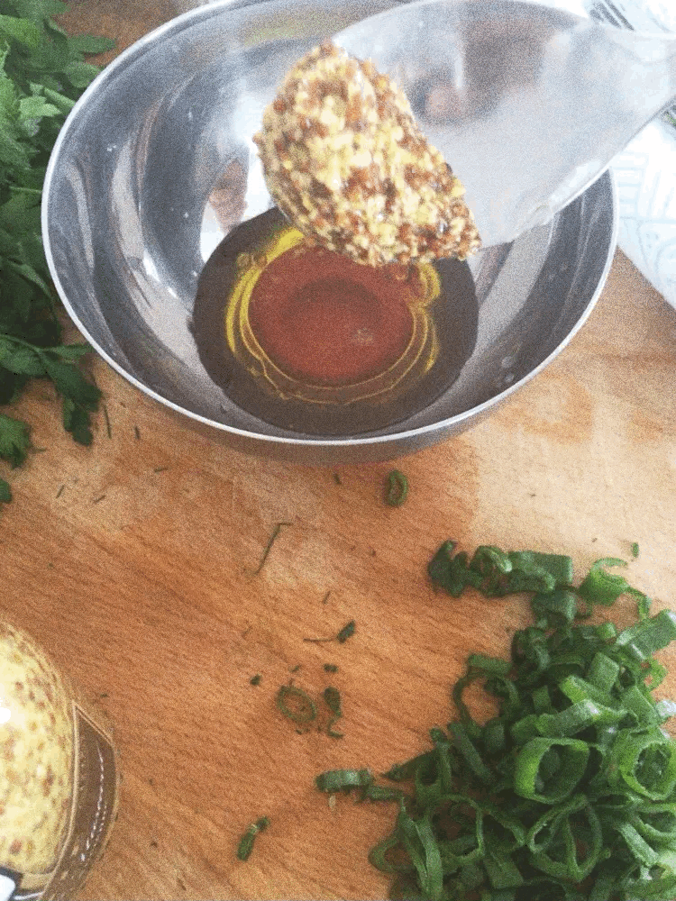 Dipping mustard in oil