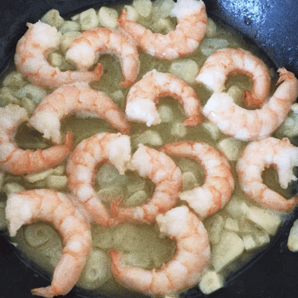 prawns frying in butter and garlic